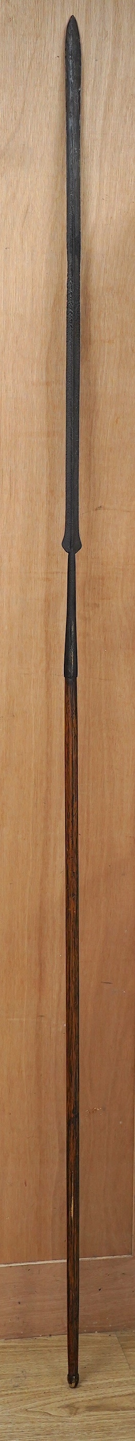A Maasai spear with iron head, 214cm. Condition - fair, heavily pitted